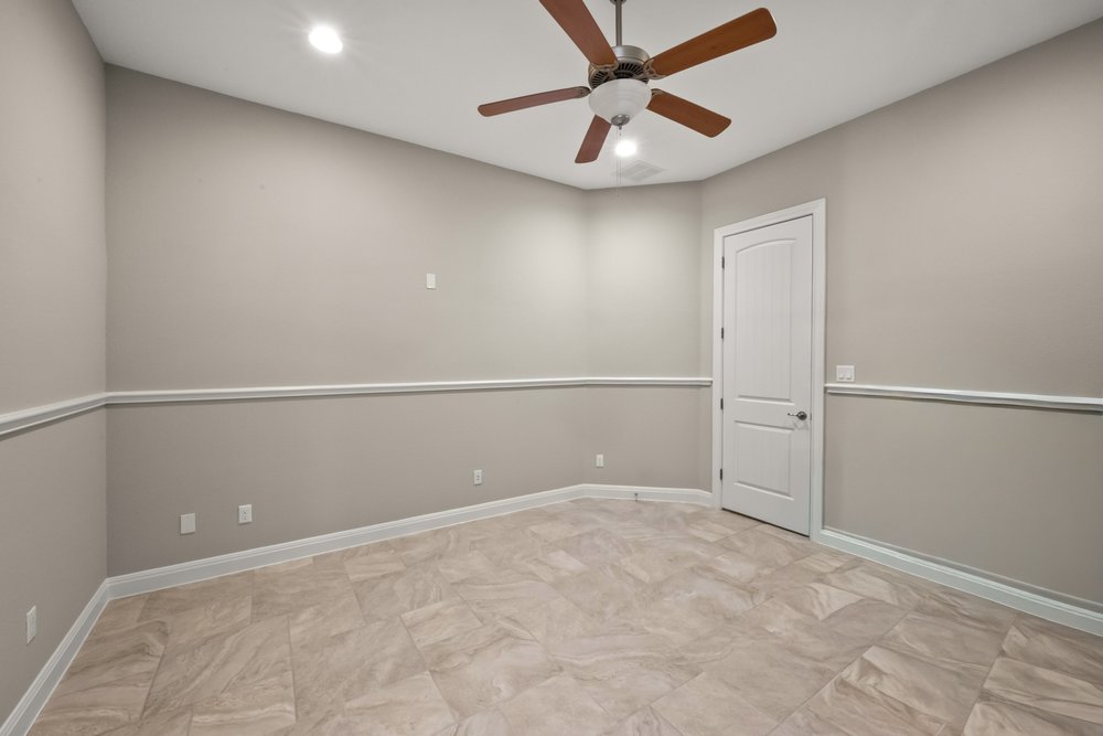 1589 Cool Spring Way Austin, TX 78737 - Photo 18 of 32 The large home office could also double as a hobby or craft room, game room or 5th bedroom.