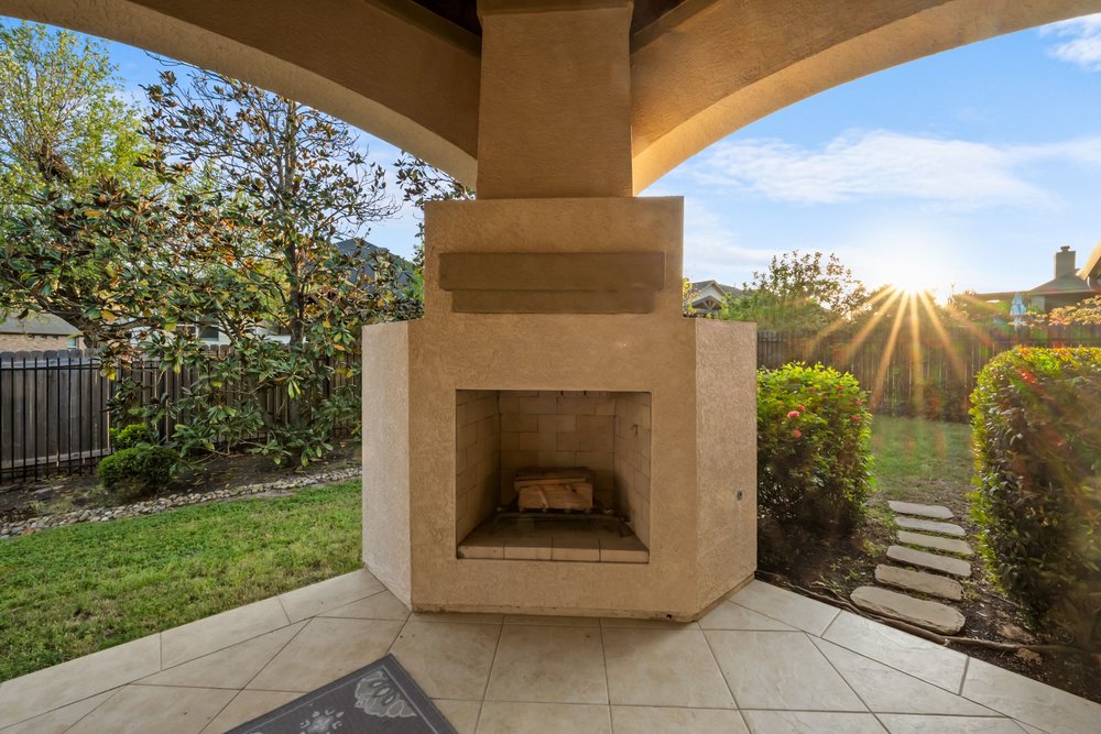1589 Cool Spring Way Austin, TX 78737 - Photo 28 of 32 The outdoor fireplace is wood burning.