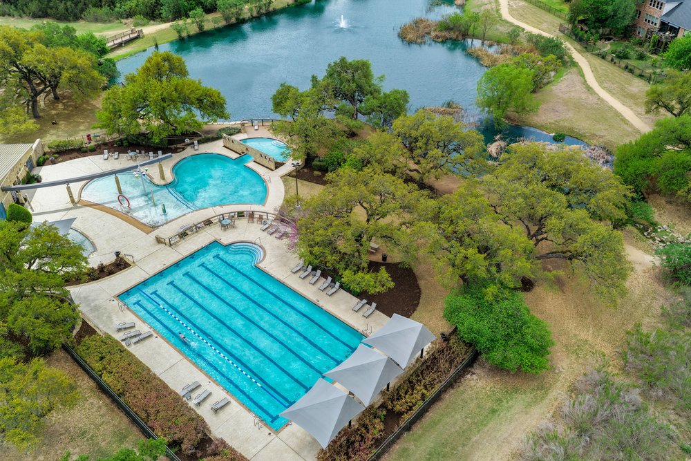 1589 Cool Spring Way Austin, TX 78737 - Photo 30 of 32 Highpointe features a variety of amenities including two pools.