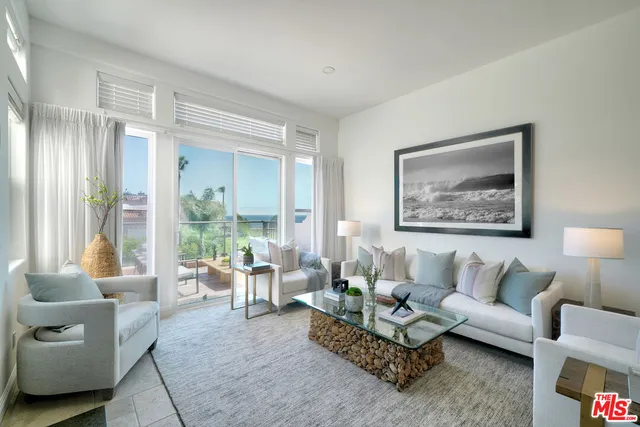 a kitchen with a sink a stove a refrigerator and cabinets