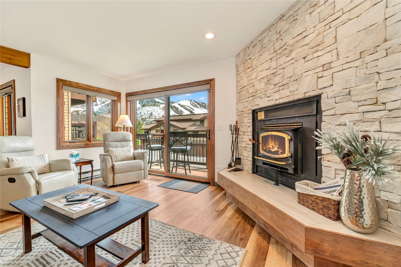 1700 Ranch Road, Unit 215 Steamboat Springs, CO 80487 - Photo 12 of 47 fireplace and ski view