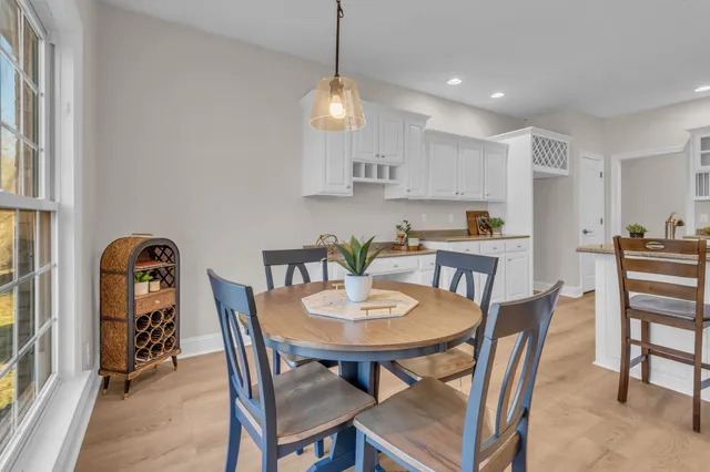 a bed room with a bed and wooden floor