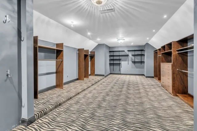 a workspace with furniture and a window