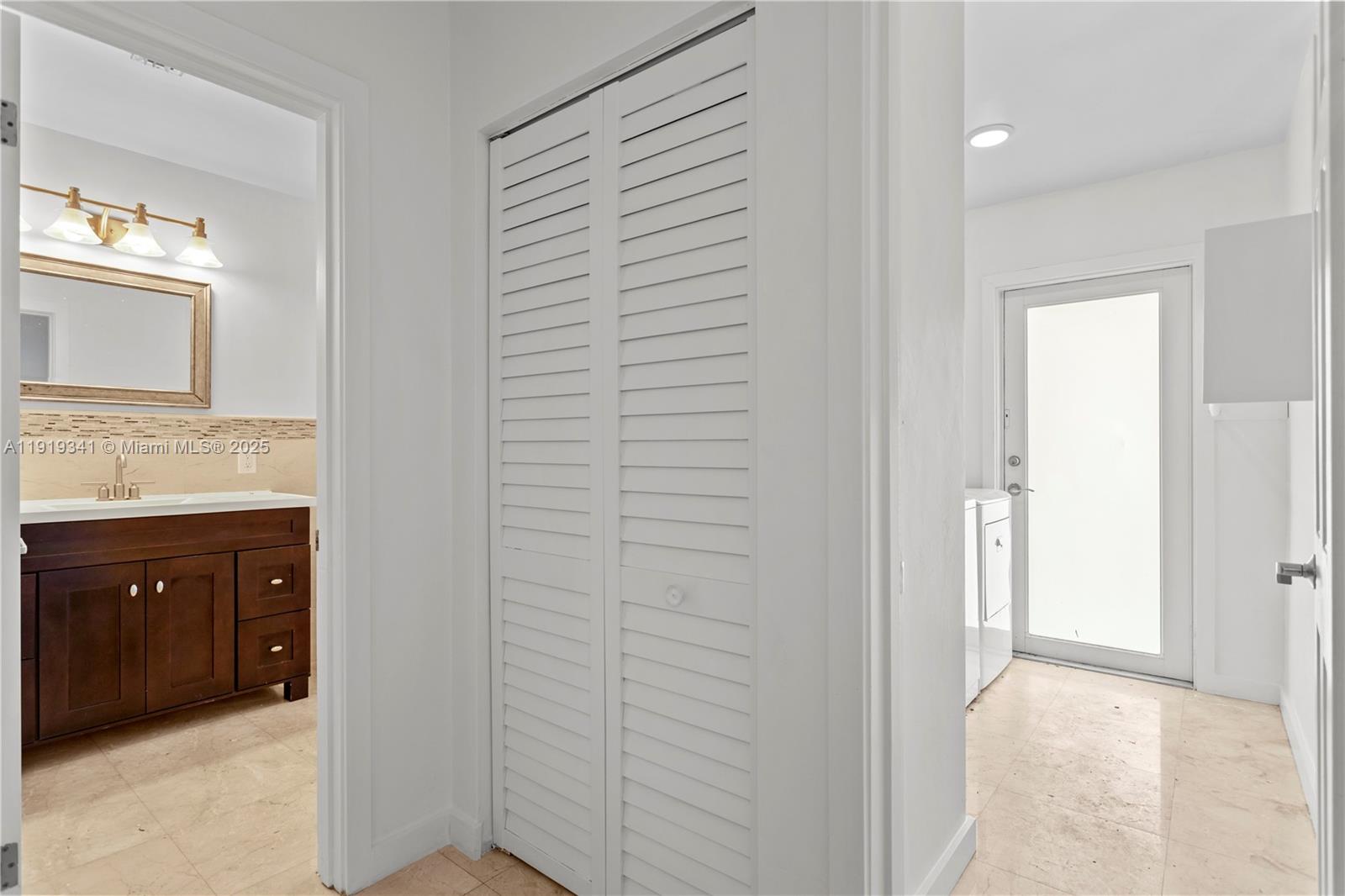 9940 Southwest 62nd Street Miami, FL 33173 - Photo 11 of 28 Cabana/ 2nd Bath entrance with ample Linen Closet