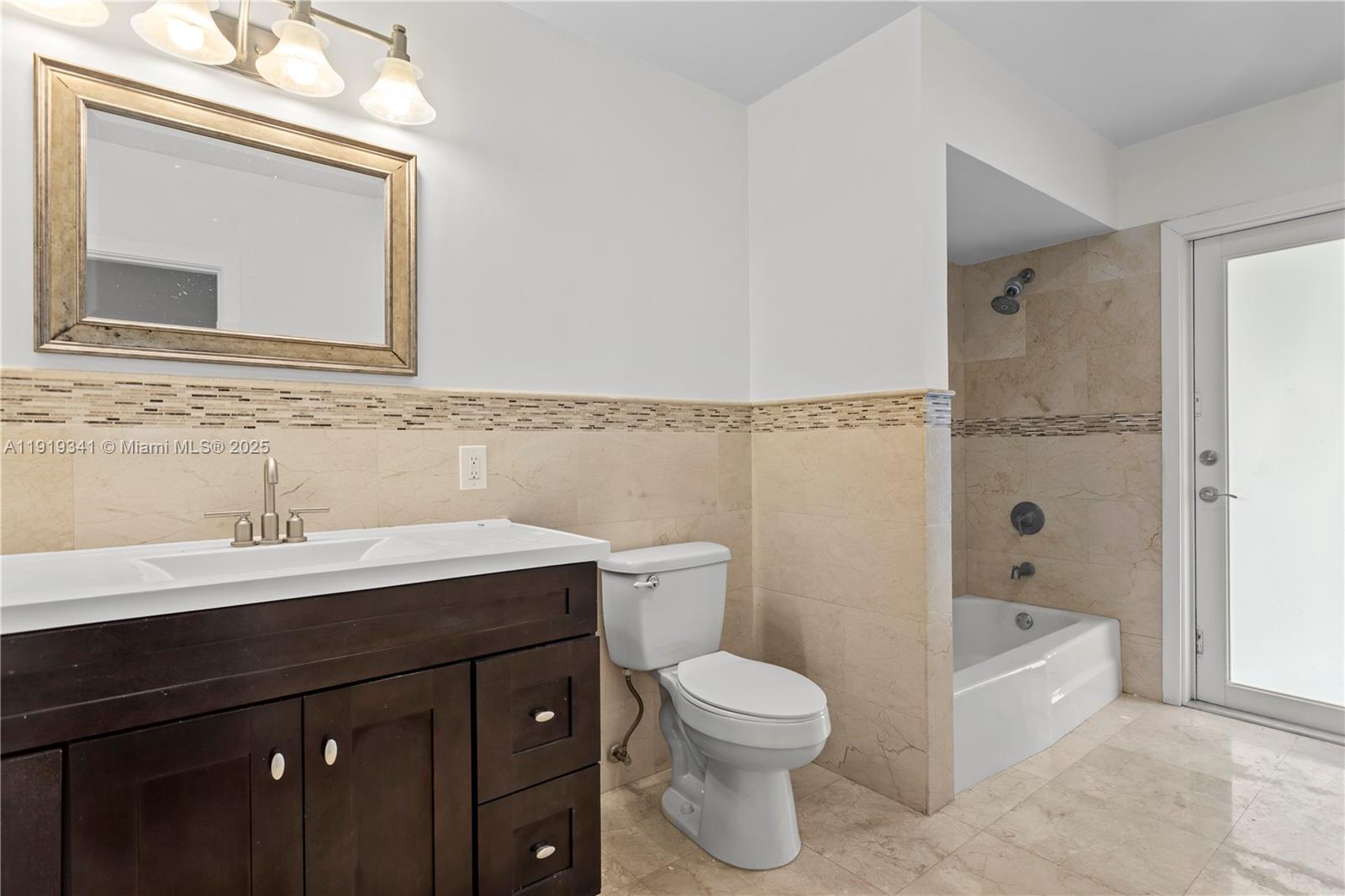 9940 Southwest 62nd Street Miami, FL 33173 - Photo 12 of 28 Ample 2nd Bathroom with access from the patio, cabana bath