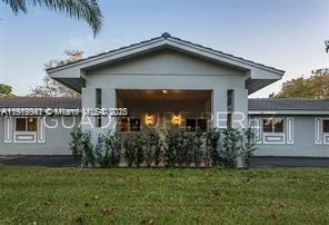 9940 Southwest 62nd Street Miami, FL 33173 - Photo 2 of 28 Closer look of the entrance and carport