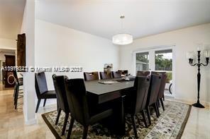 9940 Southwest 62nd Street Miami, FL 33173 - Photo 21 of 28 Sample decoration of ample Dining area.