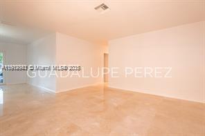 9940 Southwest 62nd Street Miami, FL 33173 - Photo 22 of 28 Other angle of the Living area and entrance to rooms