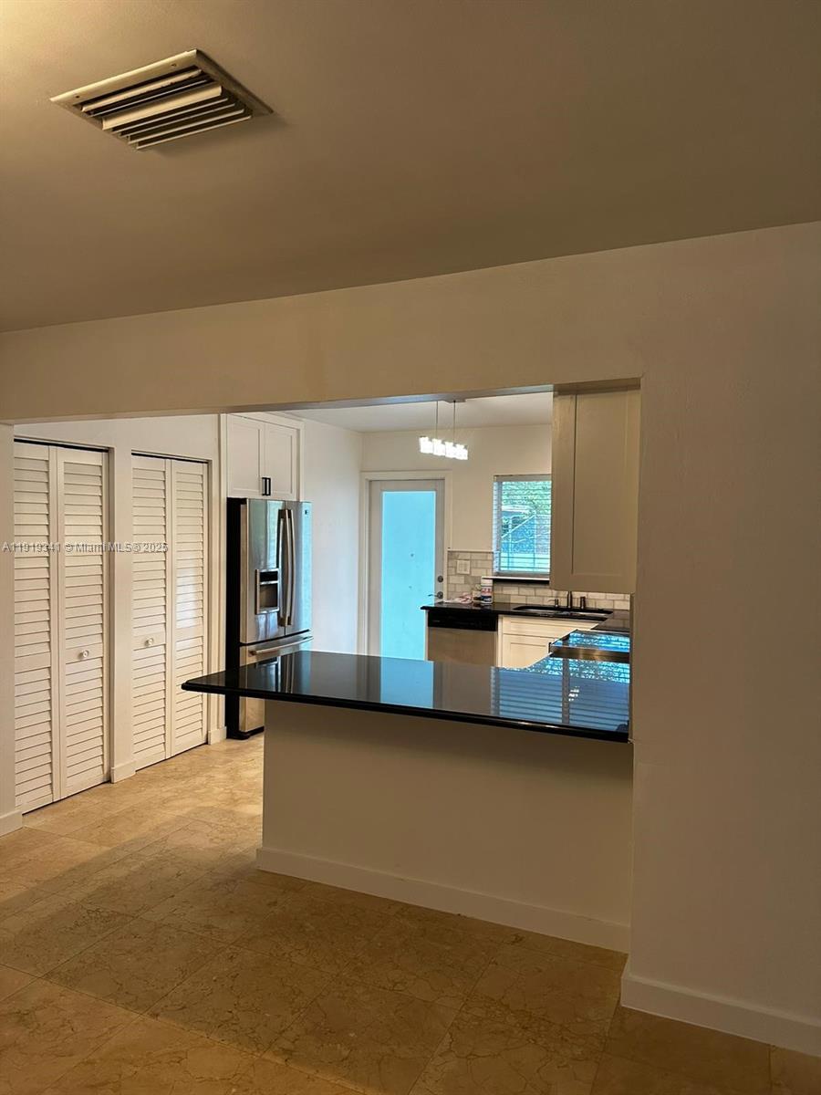 9940 Southwest 62nd Street Miami, FL 33173 - Photo 24 of 28 NEW KITCHEN