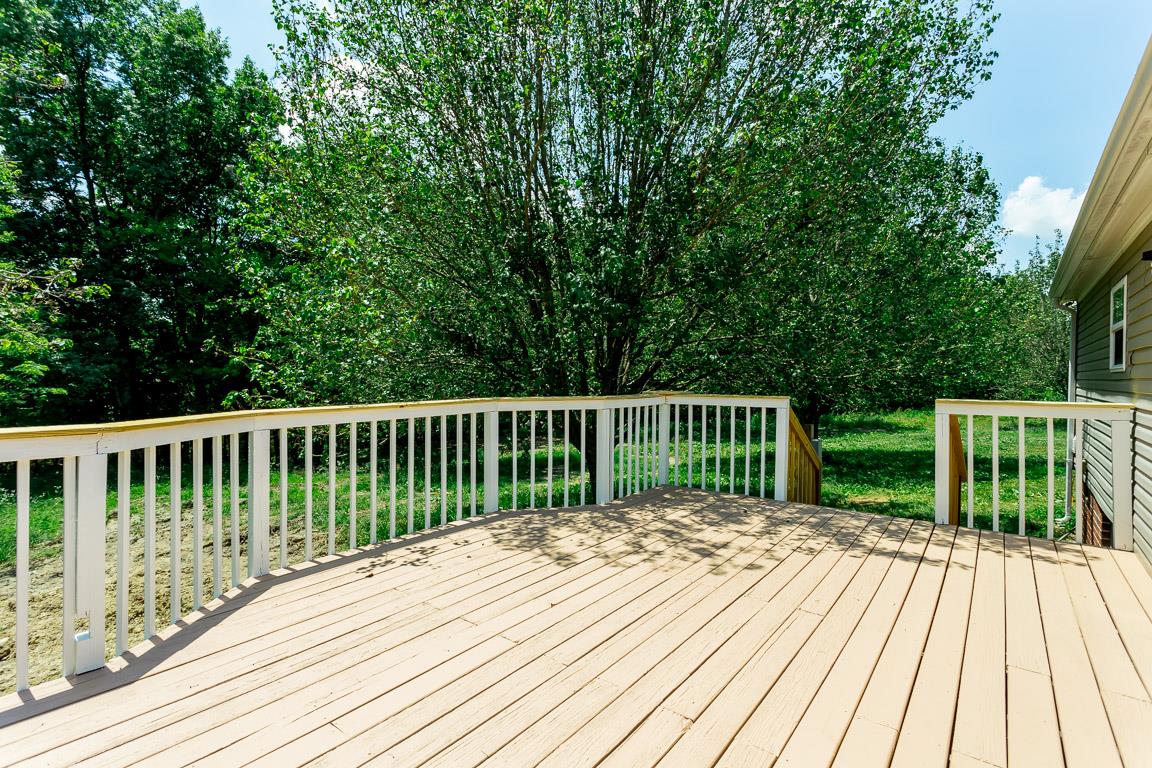744 Tracy Road Watertown, TN 37184 - Photo 16 of 18 a view of a wooden deck