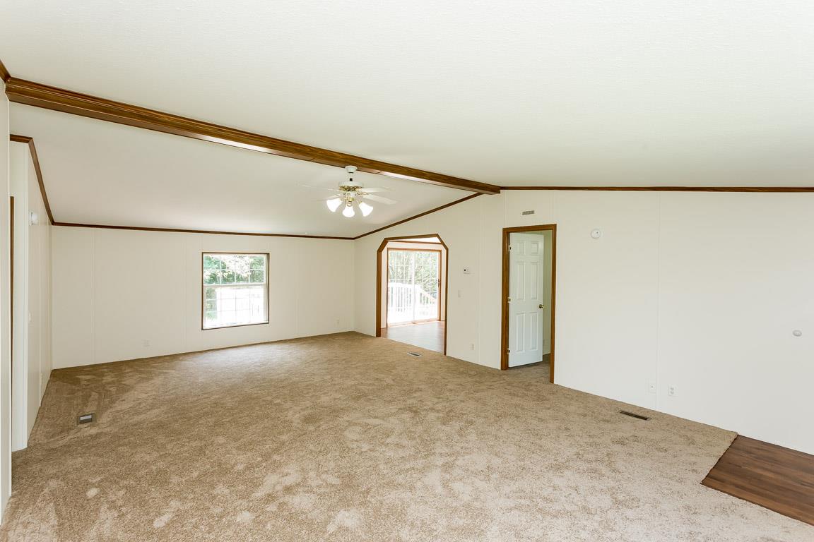 744 Tracy Road Watertown, TN 37184 - Photo 5 of 18 a view of a big room with window and stairs