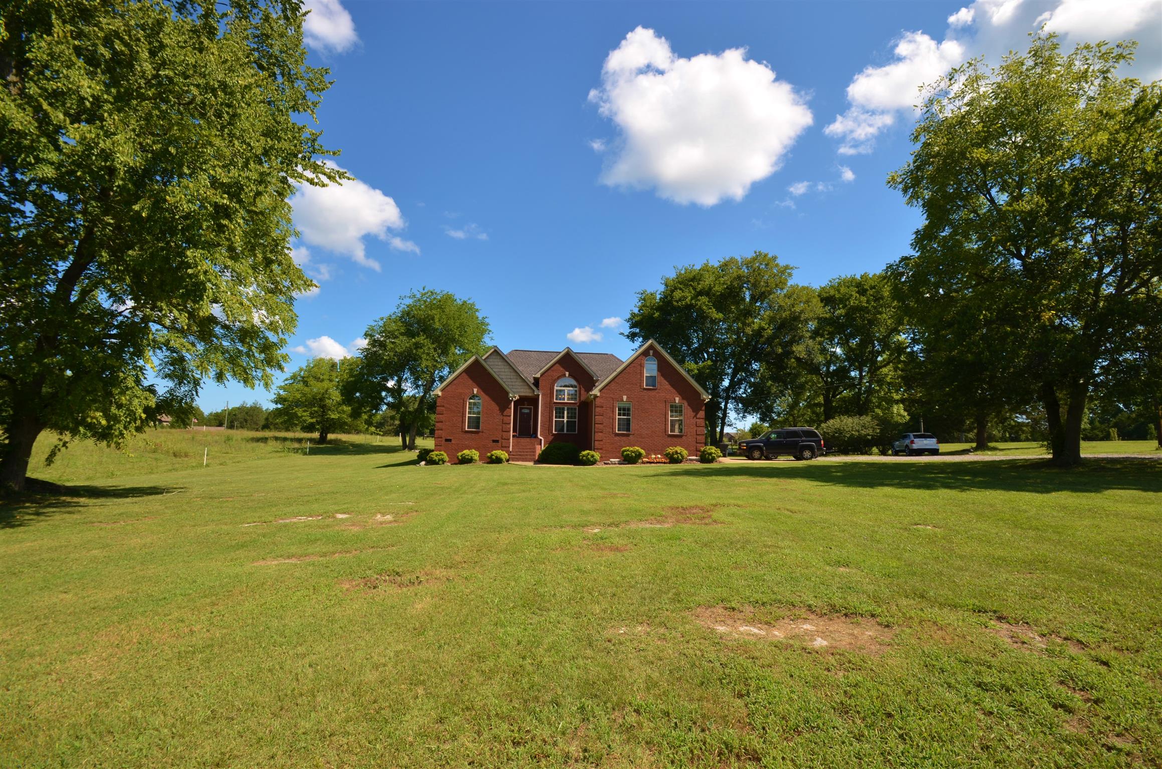 391 Vesta Road Lebanon, TN 37090 - Photo 1 of 24 a front view of a house with a big yard