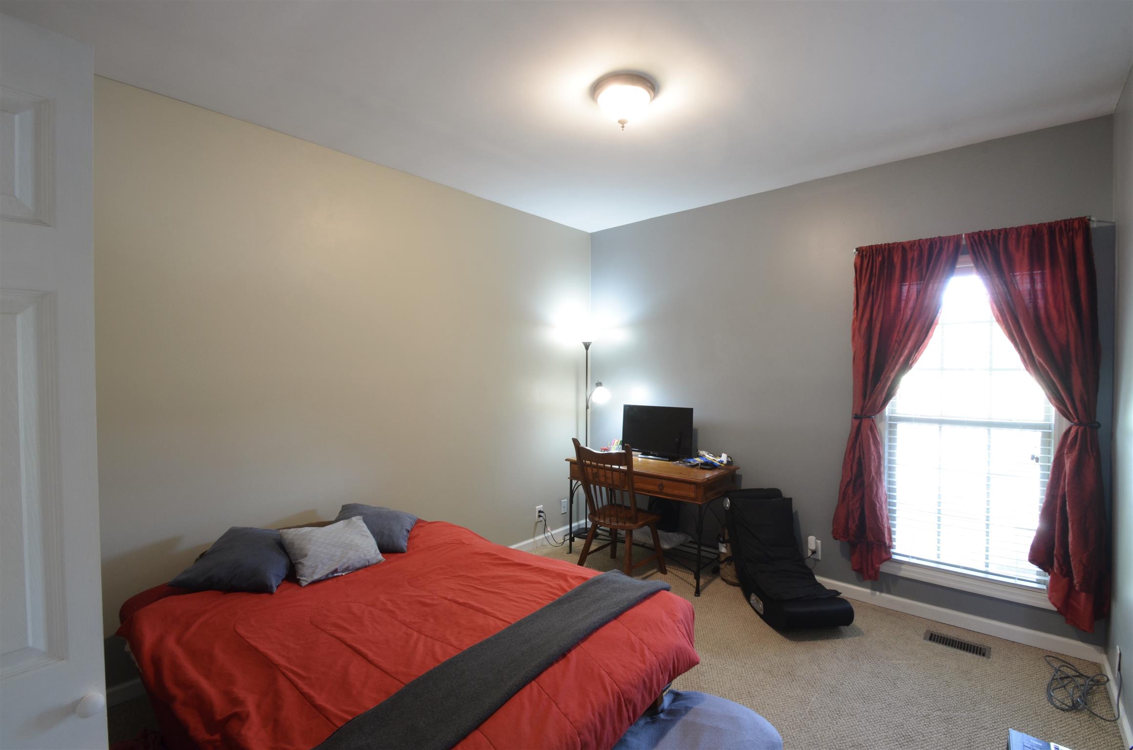 391 Vesta Road Lebanon, TN 37090 - Photo 18 of 24 a bedroom with a bed and a window