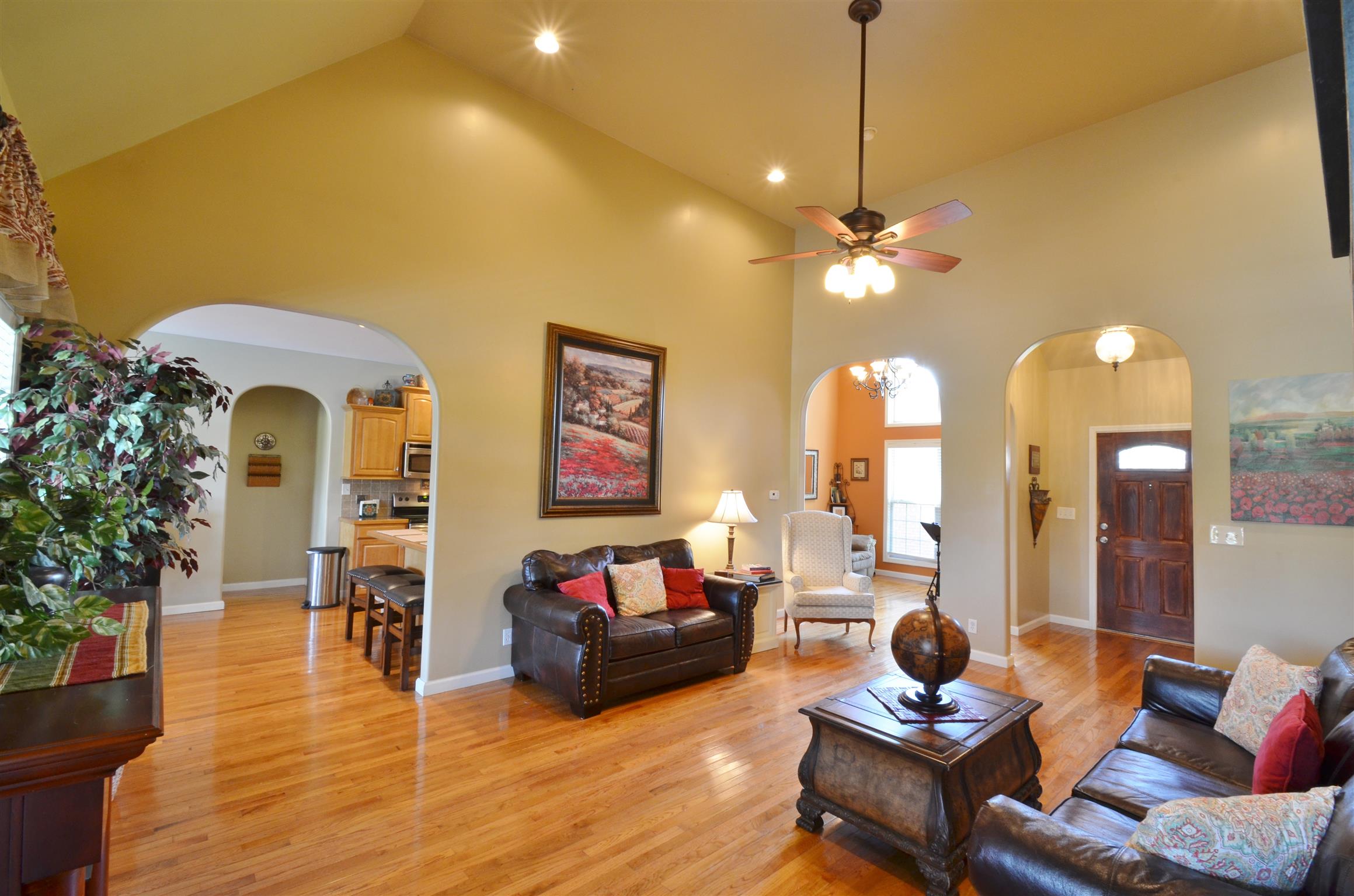 391 Vesta Road Lebanon, TN 37090 - Photo 5 of 24 a living room with furniture and a chandelier