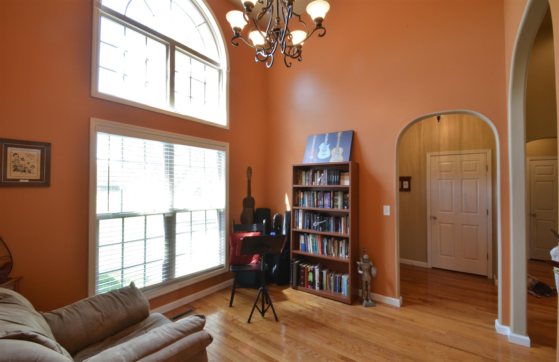 391 Vesta Road Lebanon, TN 37090 - Photo 10 of 24 a living room with furniture a bookshelf and a window
