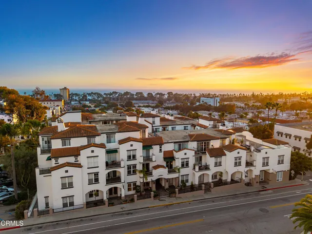 a view of city with tall buildings