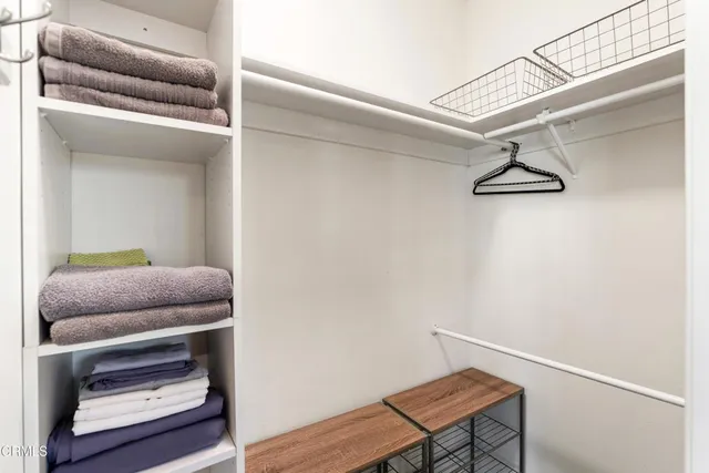 a room with furniture and a wooden floor