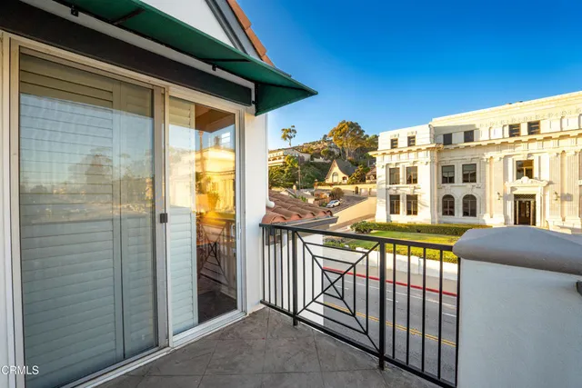 a view of a building from a balcony