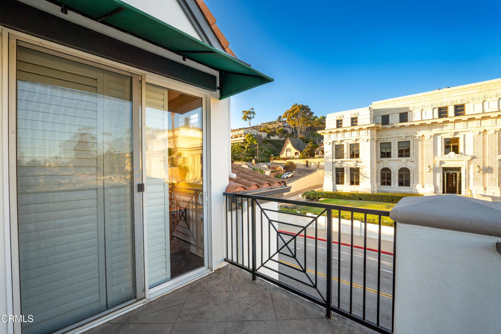 436 Poli Street, Unit 404 Ventura, CA 93001 - Photo 28 of 32 a view of a building from a balcony