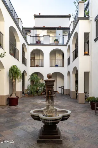 a front view of a building with glass windows