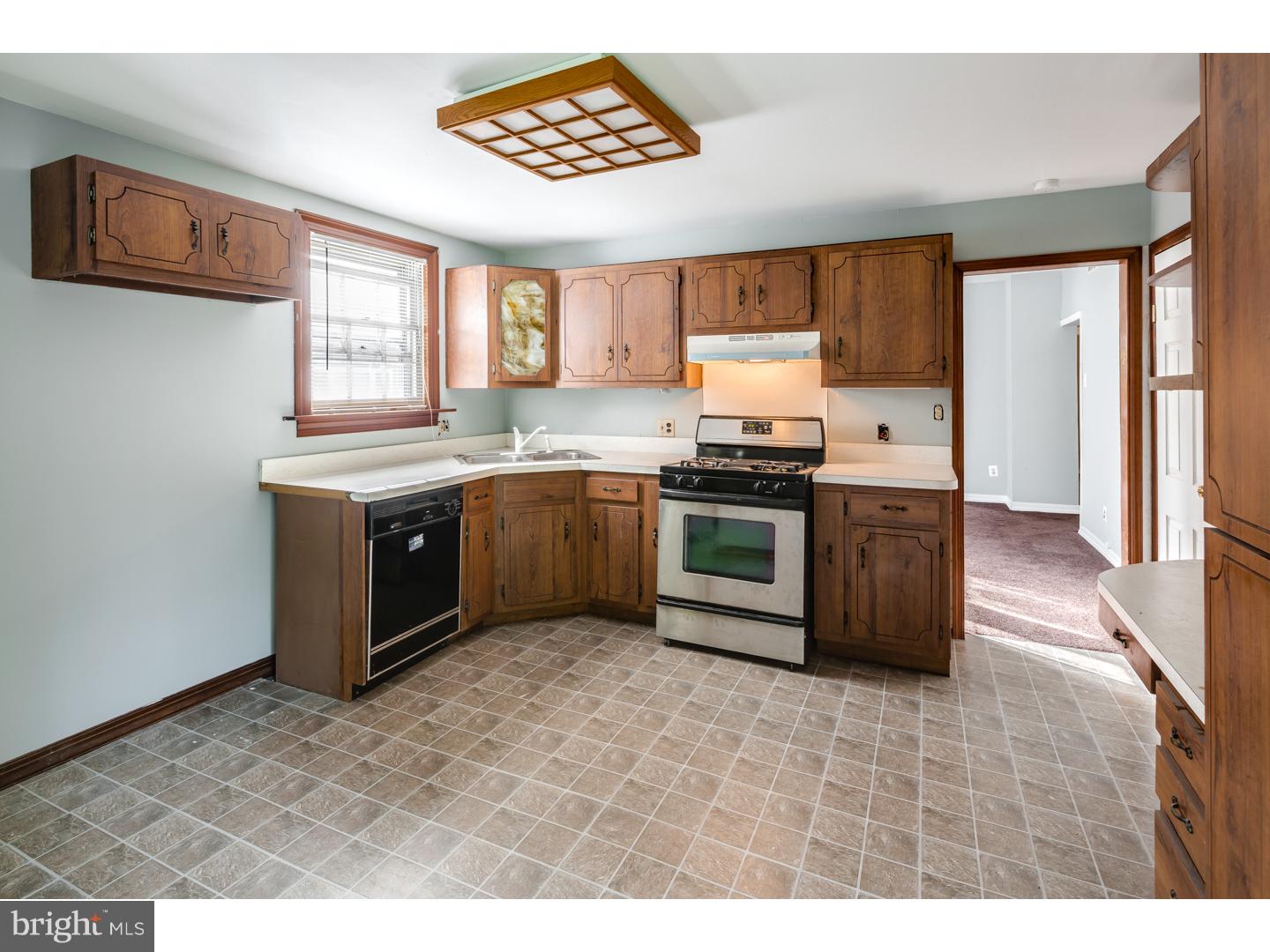 18 Princeton Road Clementon, NJ 08021 - Photo 3 of 19 a kitchen with stainless steel appliances granite countertop a stove a sink dishwasher and a refrigerator