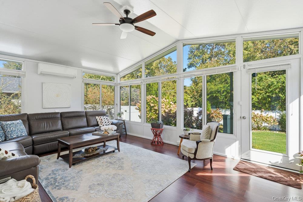 20 Vista Road Plainview, NY 11803 - Photo 16 of 37 a living room with furniture and a large window