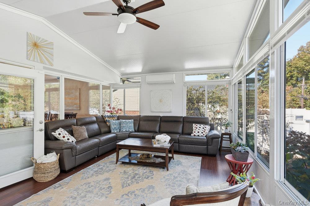 20 Vista Road Plainview, NY 11803 - Photo 17 of 37 a living room with furniture and a large window