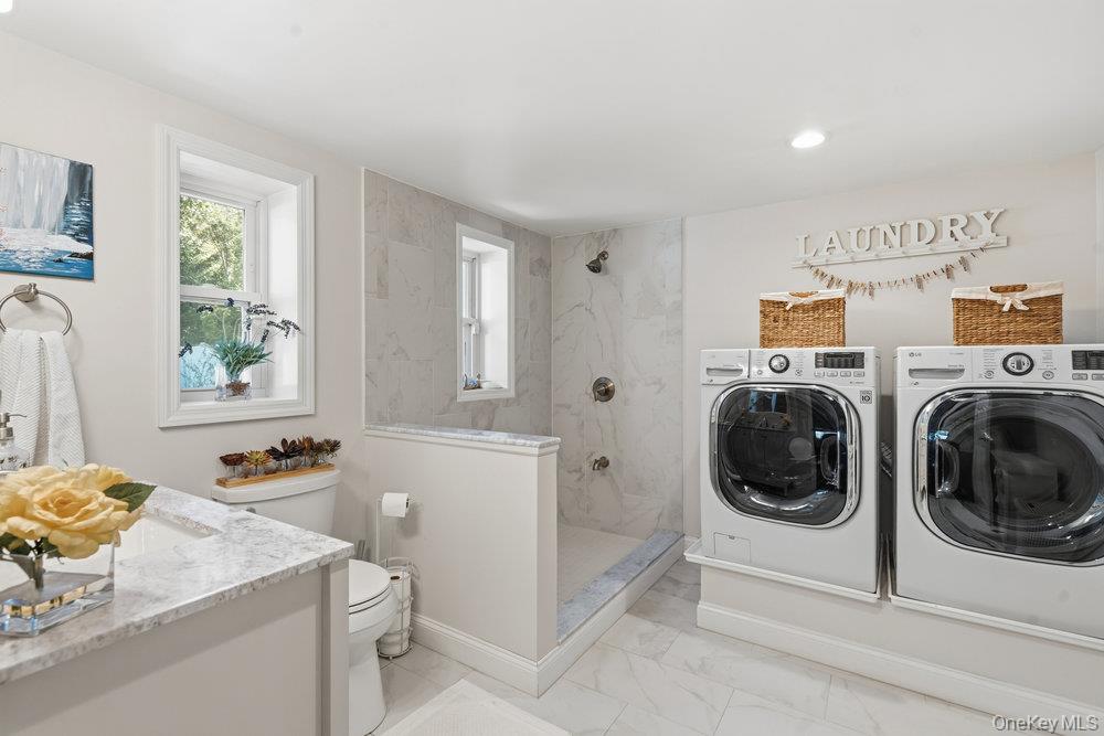 20 Vista Road Plainview, NY 11803 - Photo 19 of 37 a utility room with sink dryer and washer