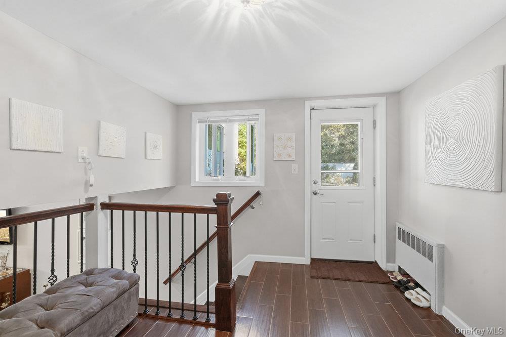 20 Vista Road Plainview, NY 11803 - Photo 20 of 37 a view of livingroom with furniture and wooden floor