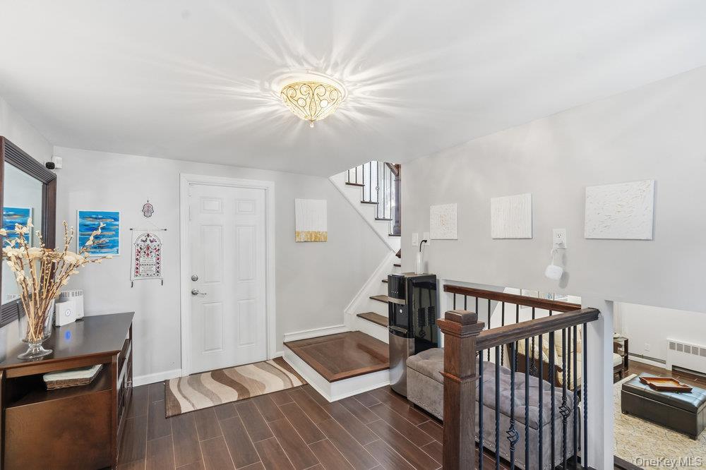 20 Vista Road Plainview, NY 11803 - Photo 21 of 37 a view of a livingroom with wooden floor and furniture