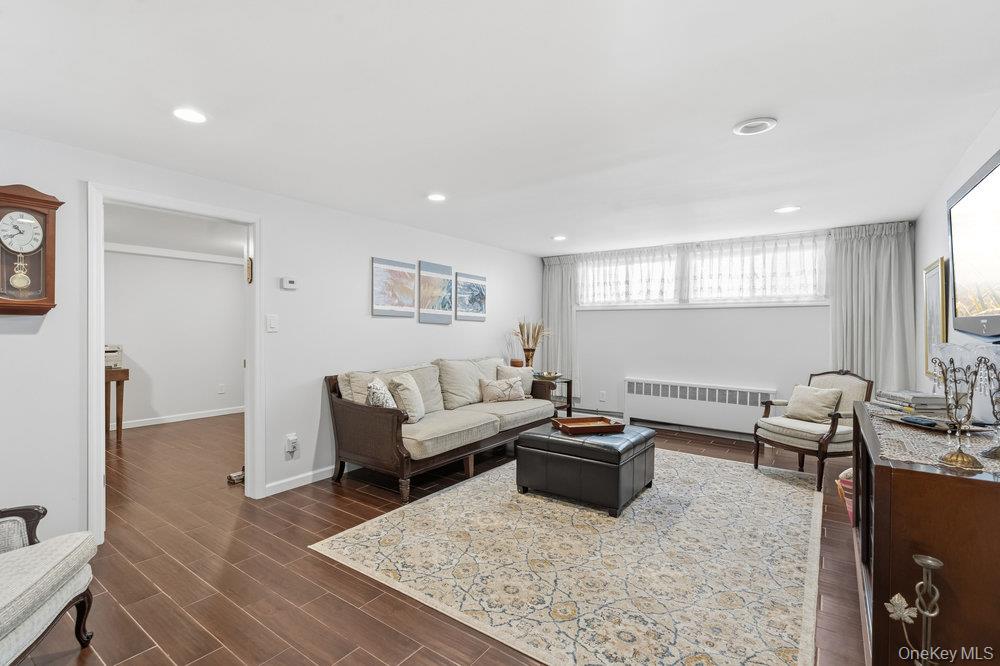 20 Vista Road Plainview, NY 11803 - Photo 22 of 37 a living room with furniture and a rug
