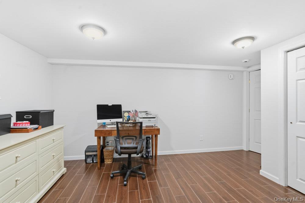 20 Vista Road Plainview, NY 11803 - Photo 25 of 37 a view of a workspace with furniture and wooden floor