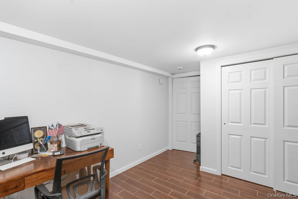 20 Vista Road Plainview, NY 11803 - Photo 26 of 37 a view of a workspace with furniture and wooden floor