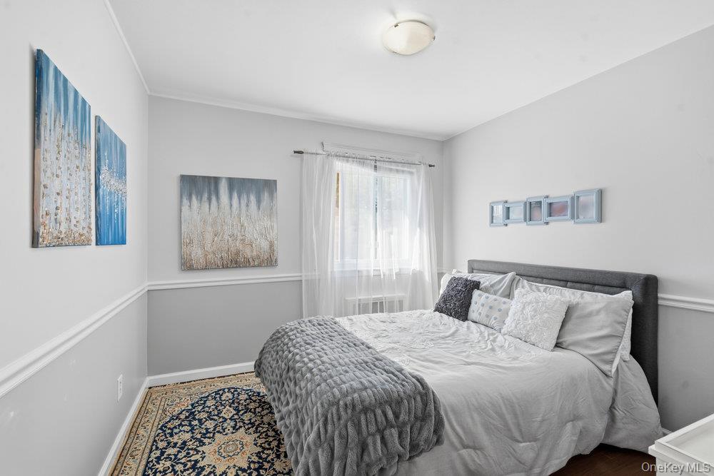 20 Vista Road Plainview, NY 11803 - Photo 27 of 37 a bedroom with a bed and a window