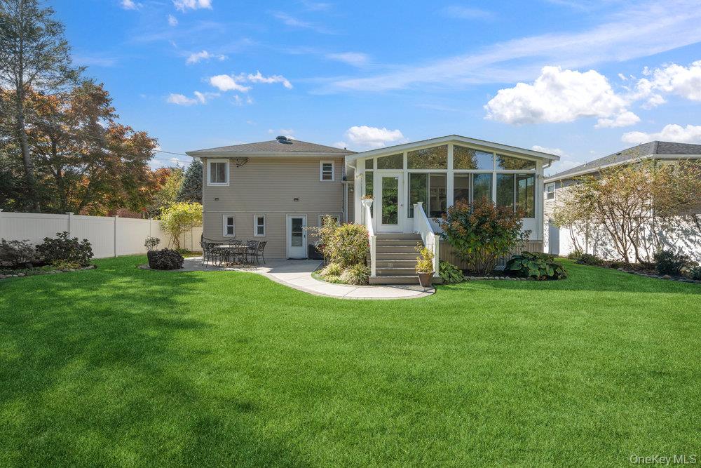 20 Vista Road Plainview, NY 11803 - Photo 35 of 37 a front view of a house with garden