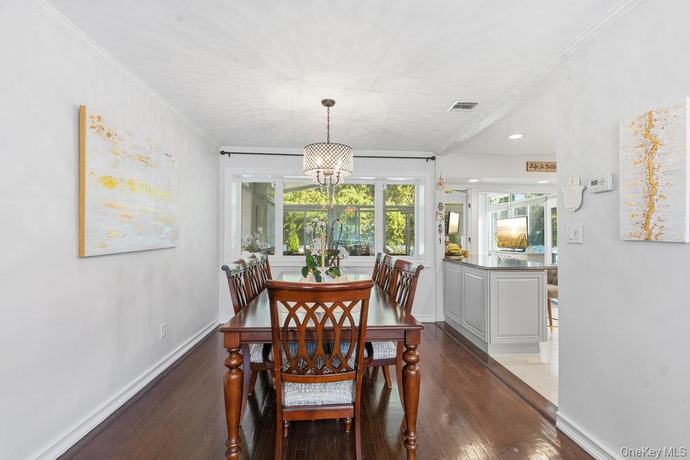 20 Vista Road Plainview, NY 11803 - Photo 9 of 37 a view of a dining room with furniture window and outside view