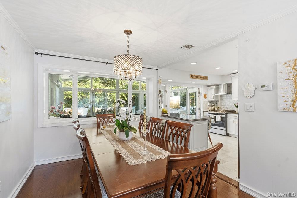20 Vista Road Plainview, NY 11803 - Photo 10 of 37 a view of a dining room with furniture window and outside view