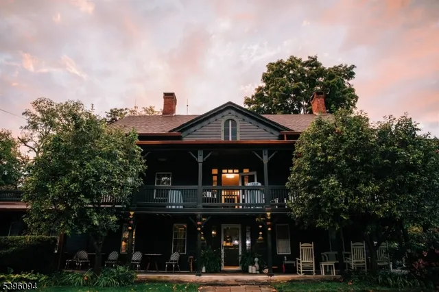 a view of a house with a street