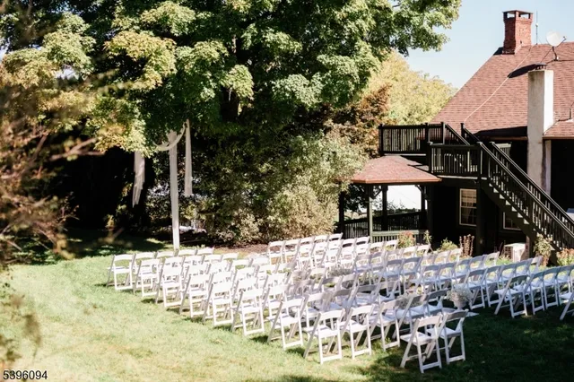 a view of a house with snow in the yard