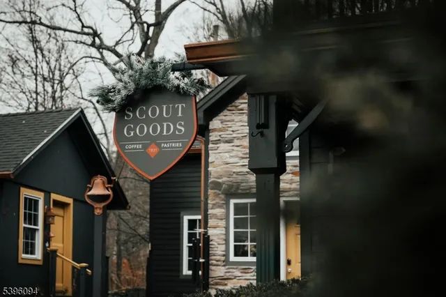 a view of a pathway of a house with backyard