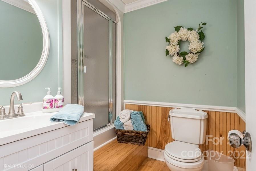 903 Jug Broome Road Monroe, NC 28112 - Photo 30 of 47 a bathroom with a sink mirror vanity and toilet