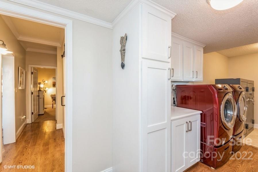 903 Jug Broome Road Monroe, NC 28112 - Photo 32 of 47 a view of walk in closet with clothes and shoes