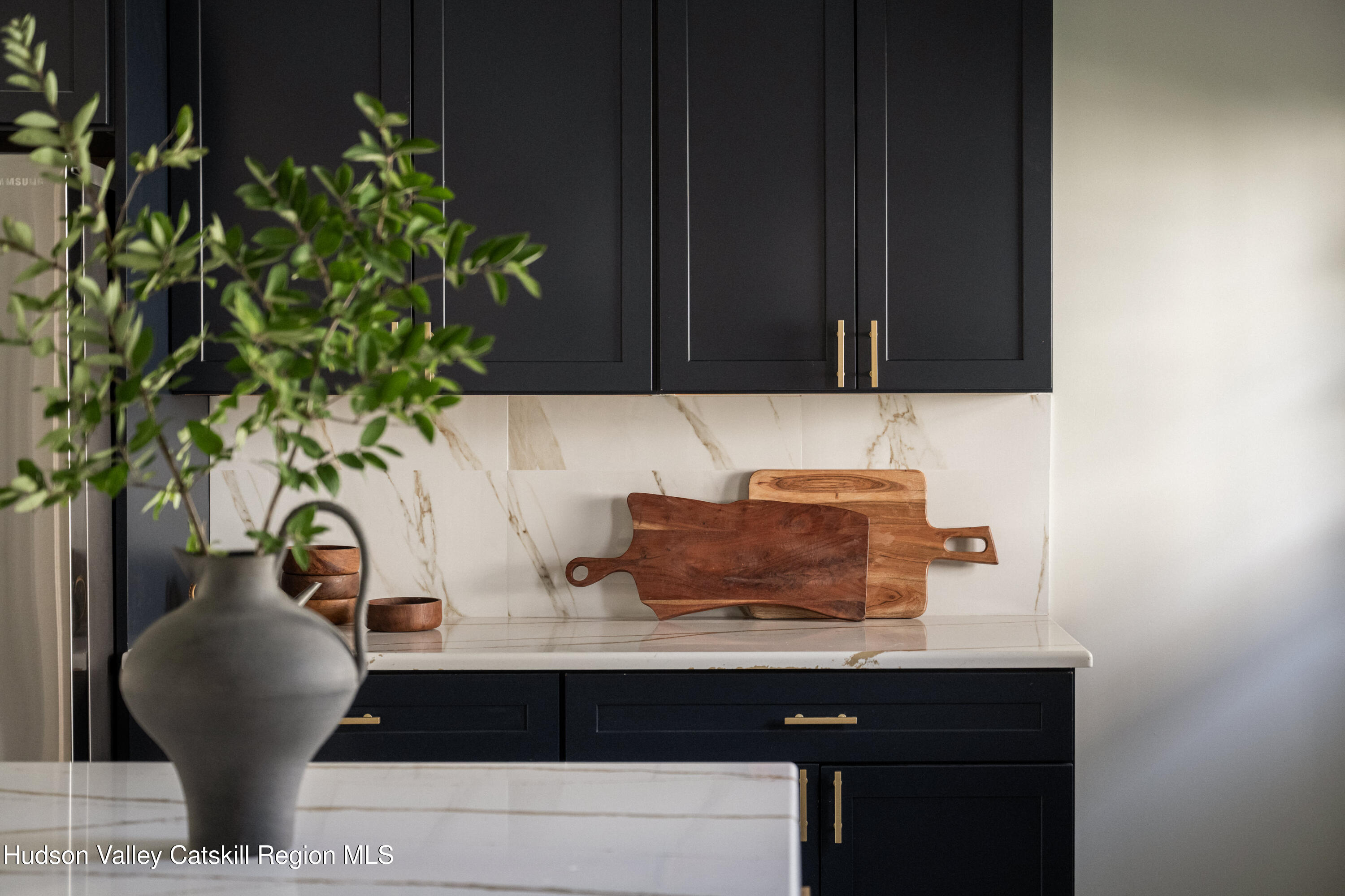 2859 Atlantic Avenue Hudson, NY 12534 - Photo 11 of 32 a view of table and chair with potted plant