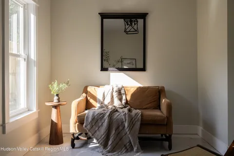 a view of a workspace with furniture