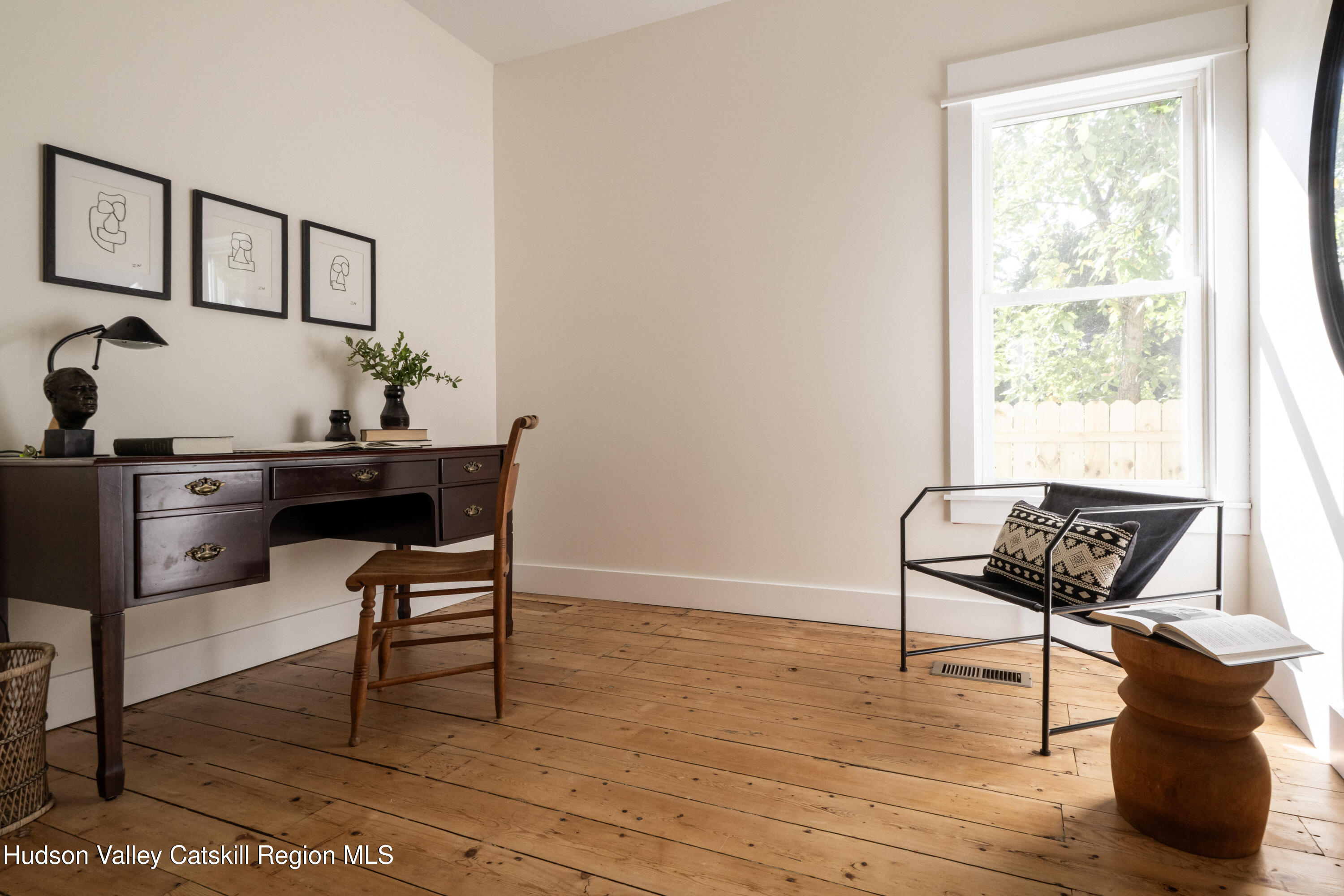 2859 Atlantic Avenue Hudson, NY 12534 - Photo 14 of 32 a living room with furniture and a potted plant