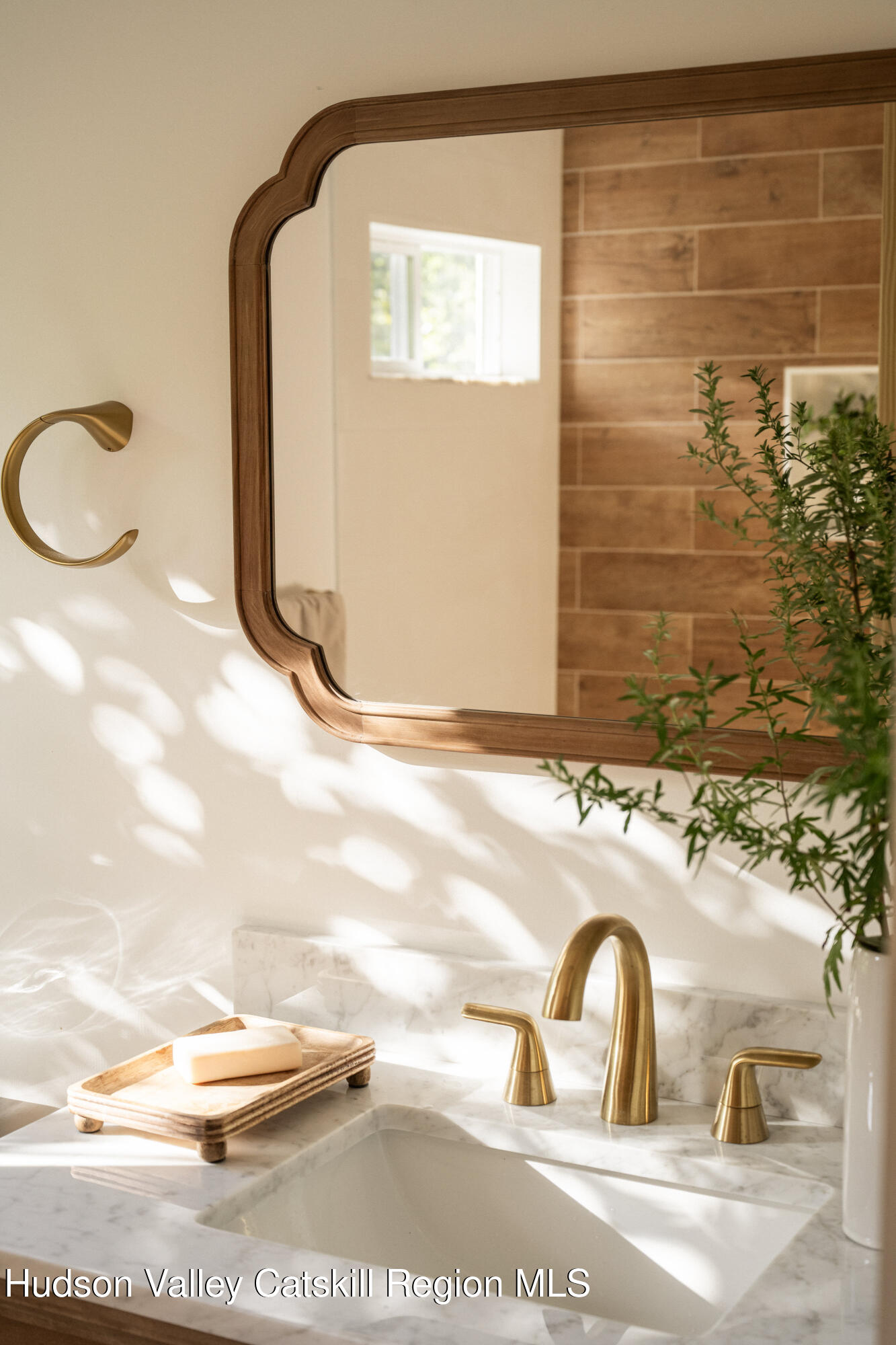 2859 Atlantic Avenue Hudson, NY 12534 - Photo 20 of 32 a bathroom with a sink and a mirror