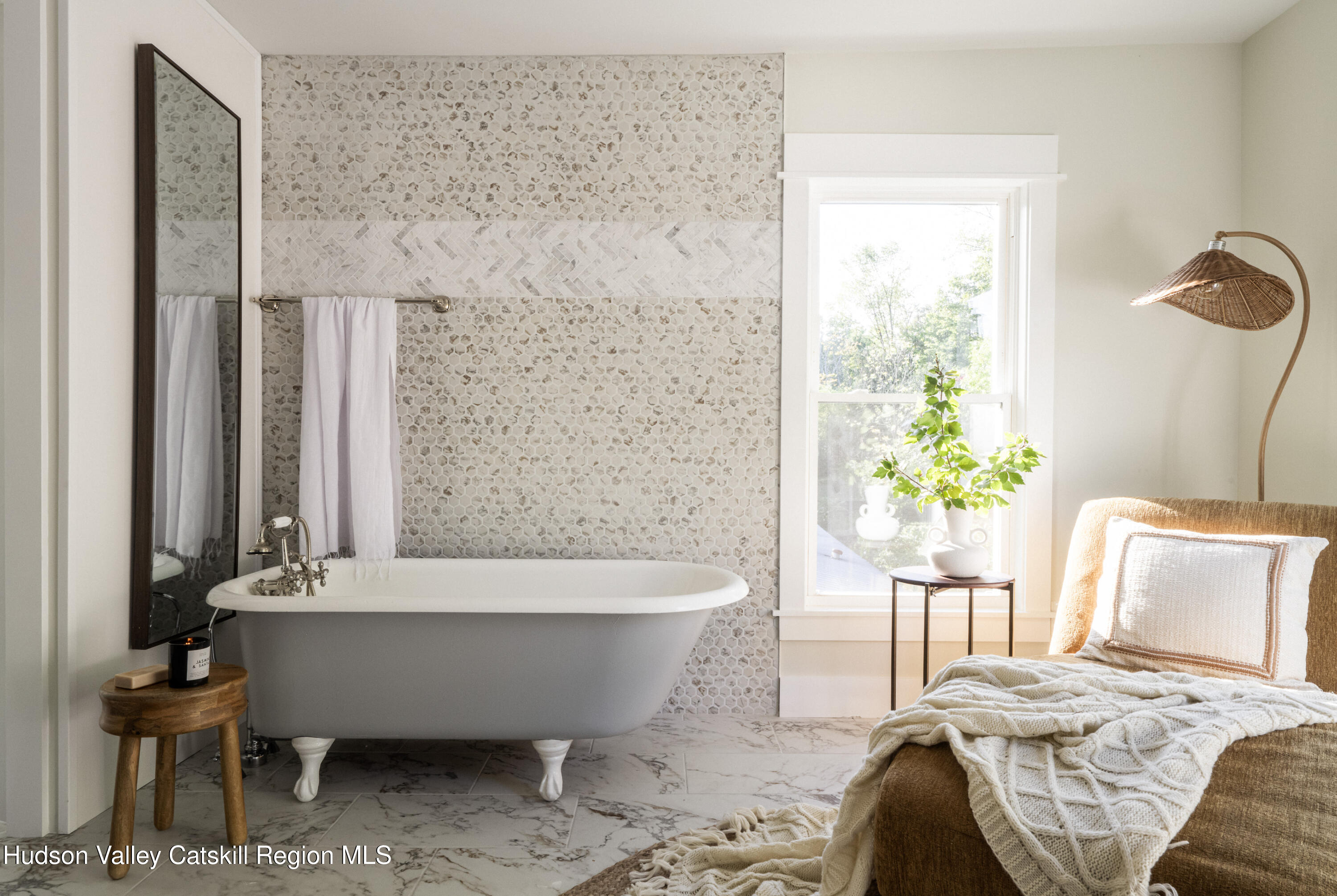 2859 Atlantic Avenue Hudson, NY 12534 - Photo 25 of 32 a bed sitting in a bedroom next to a window and a potted plant