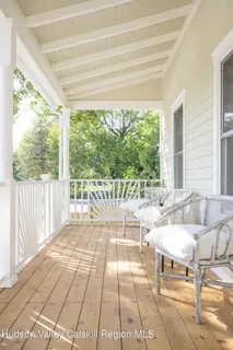 a living room with a couch and a large window