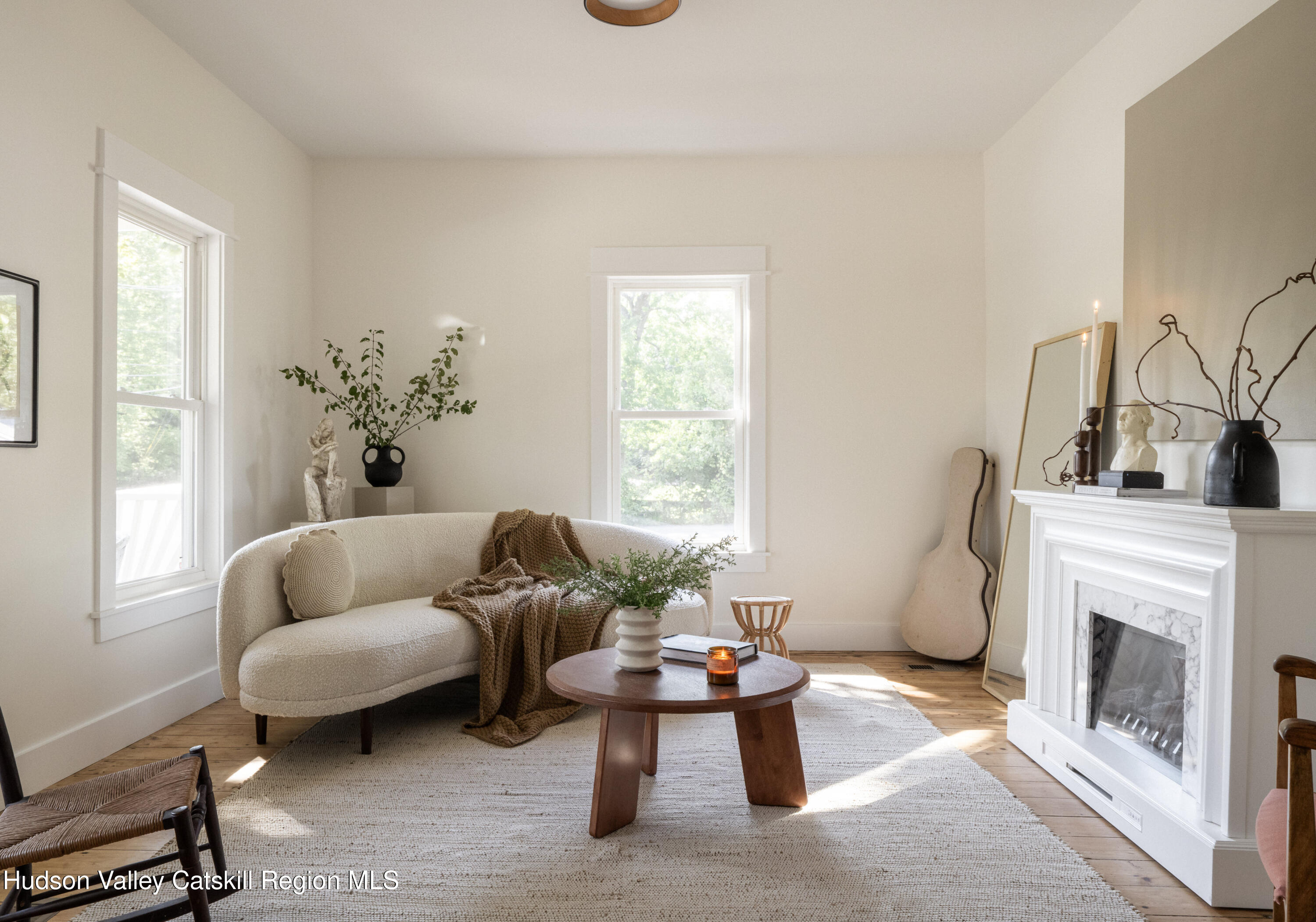 2859 Atlantic Avenue Hudson, NY 12534 - Photo 5 of 32 a living room with furniture and a fireplace