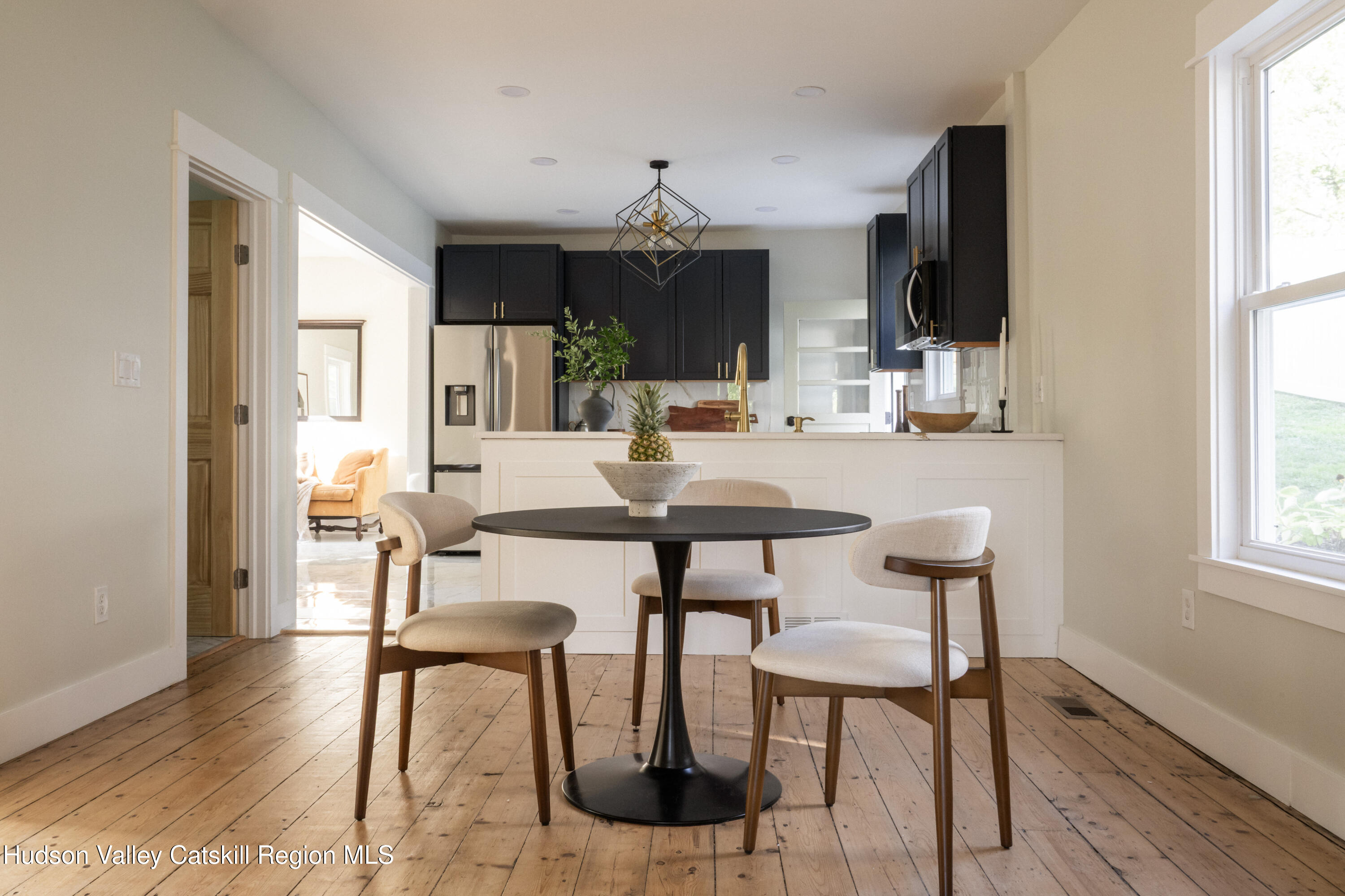 2859 Atlantic Avenue Hudson, NY 12534 - Photo 6 of 32 a view of a dining room with furniture and window